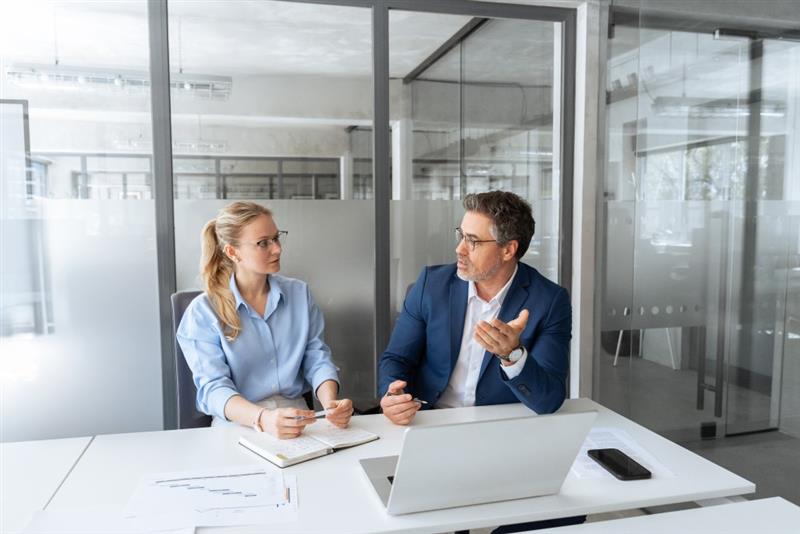 women and man in the office
