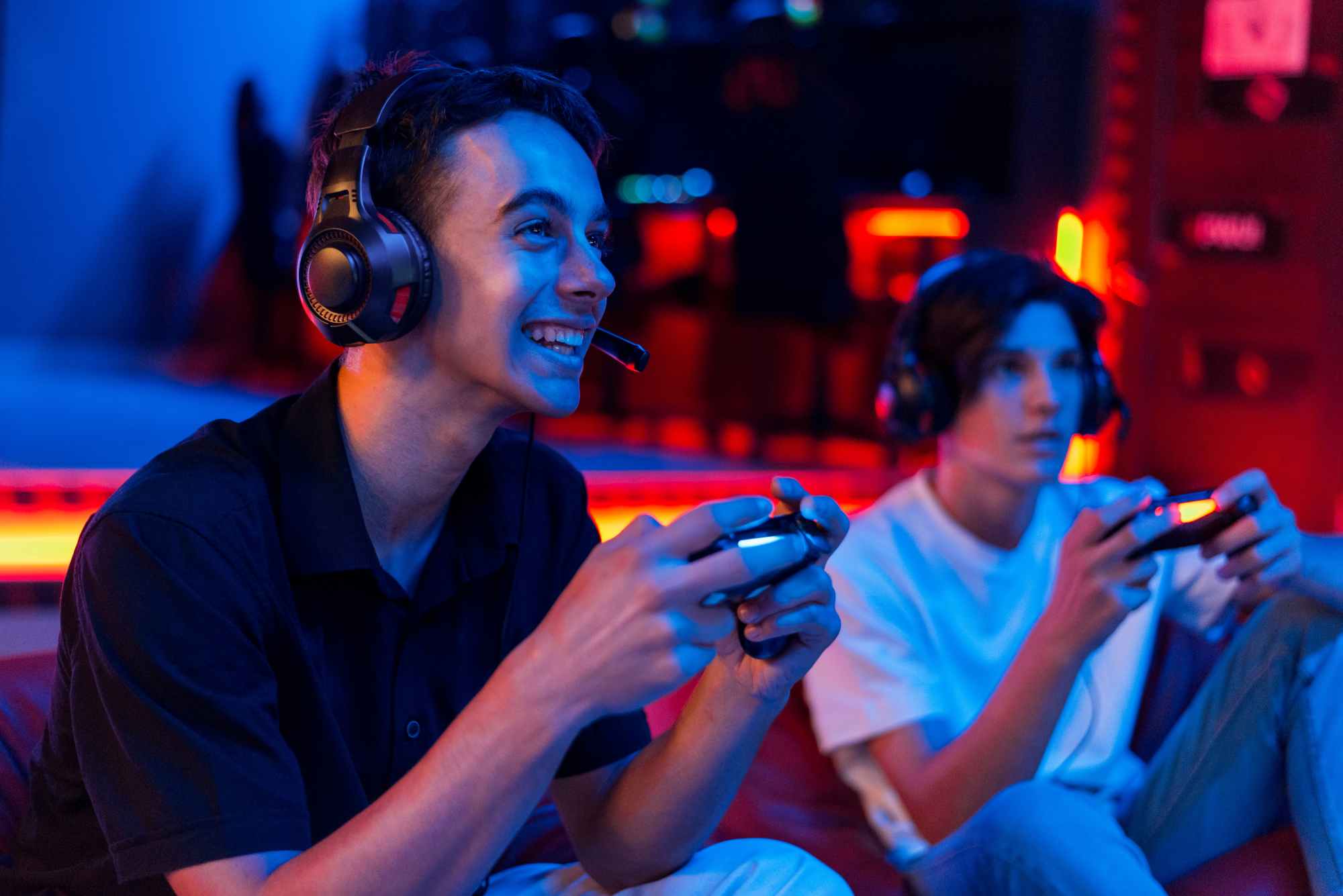 Two young people playing video games