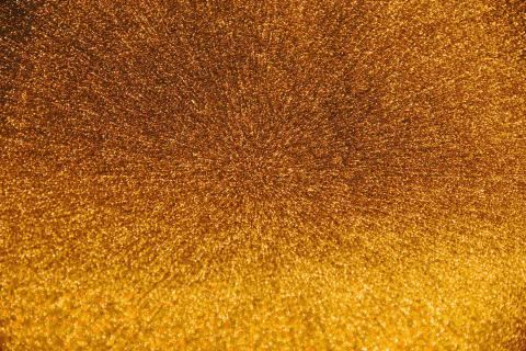 golden dust particles