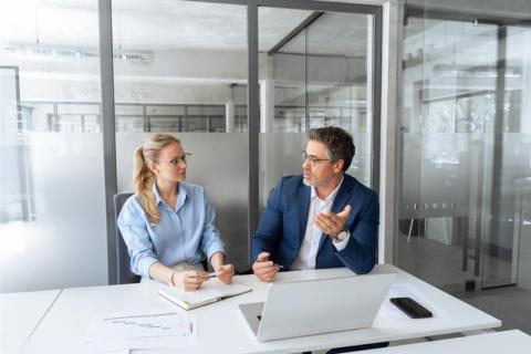 women and man in the office